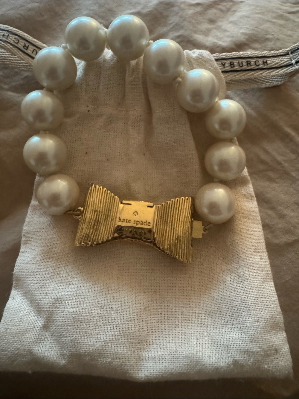 kate spade White Pearl Bracelet with Gold Bow Clasp